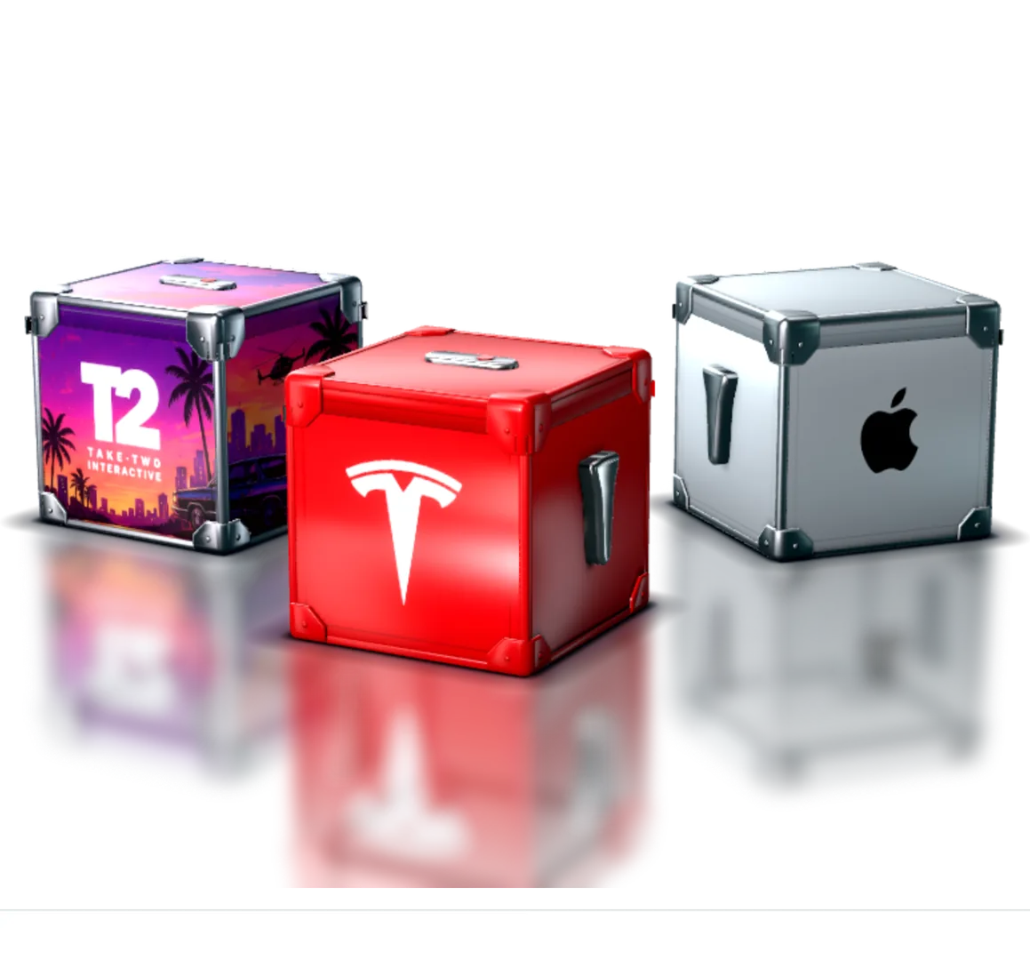 Red Tesla box in front, a purple Take-Two box and a silver Apple box behind it, on a teal studio floor